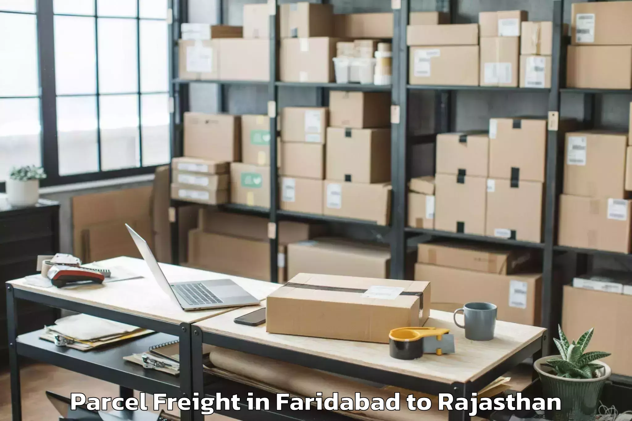 Faridabad to Haridev Joshi University Of Jo Parcel Freight Booking